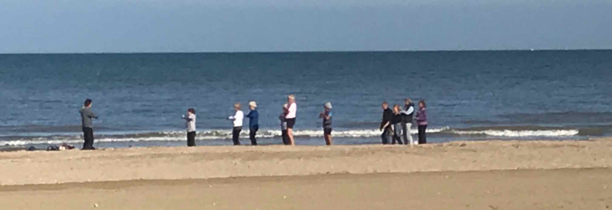 certain age French exercising on beach in September