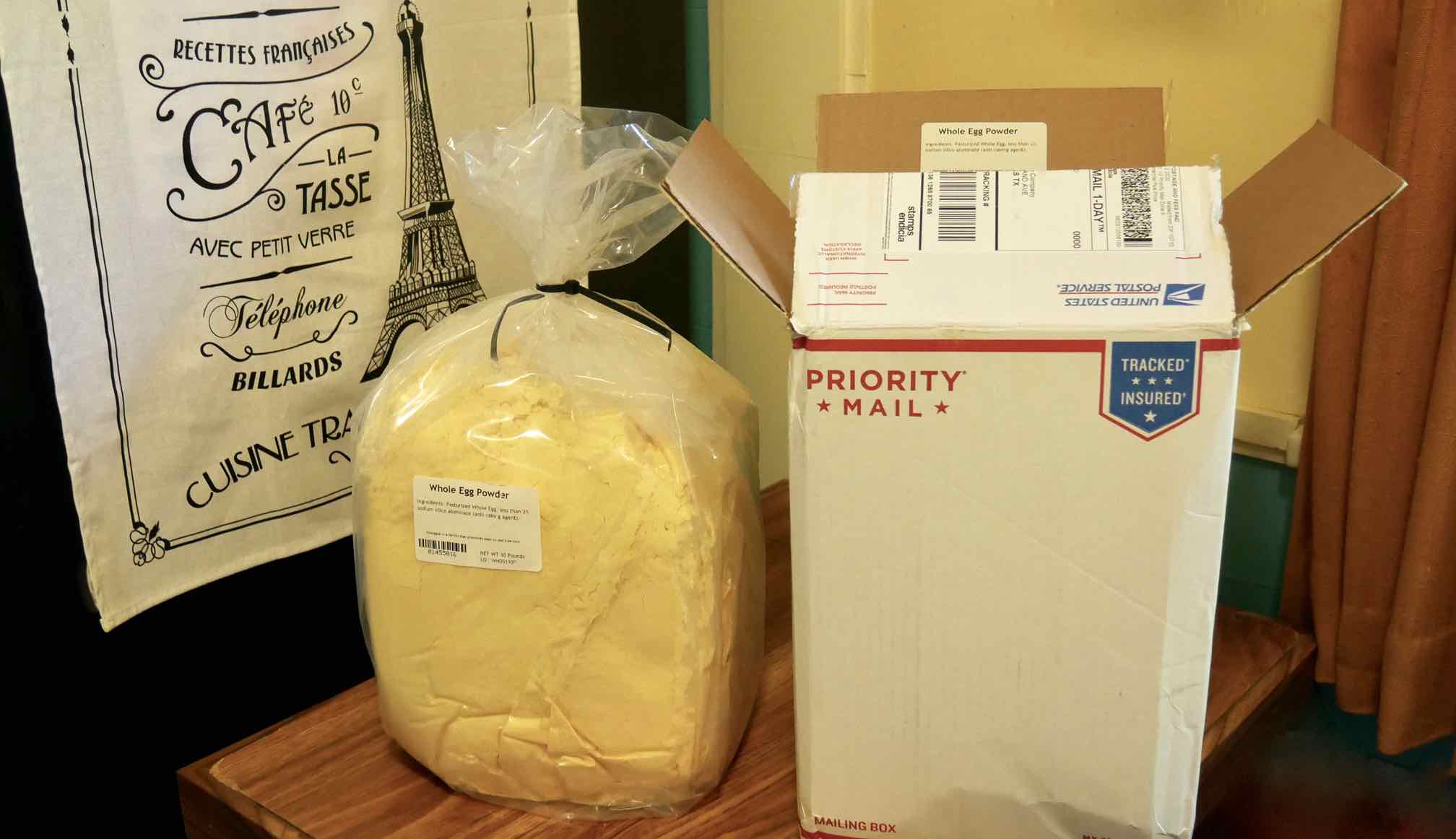 10 pounds of dried egg powder in plastic bag and the Priority Mail box in which it was shipped