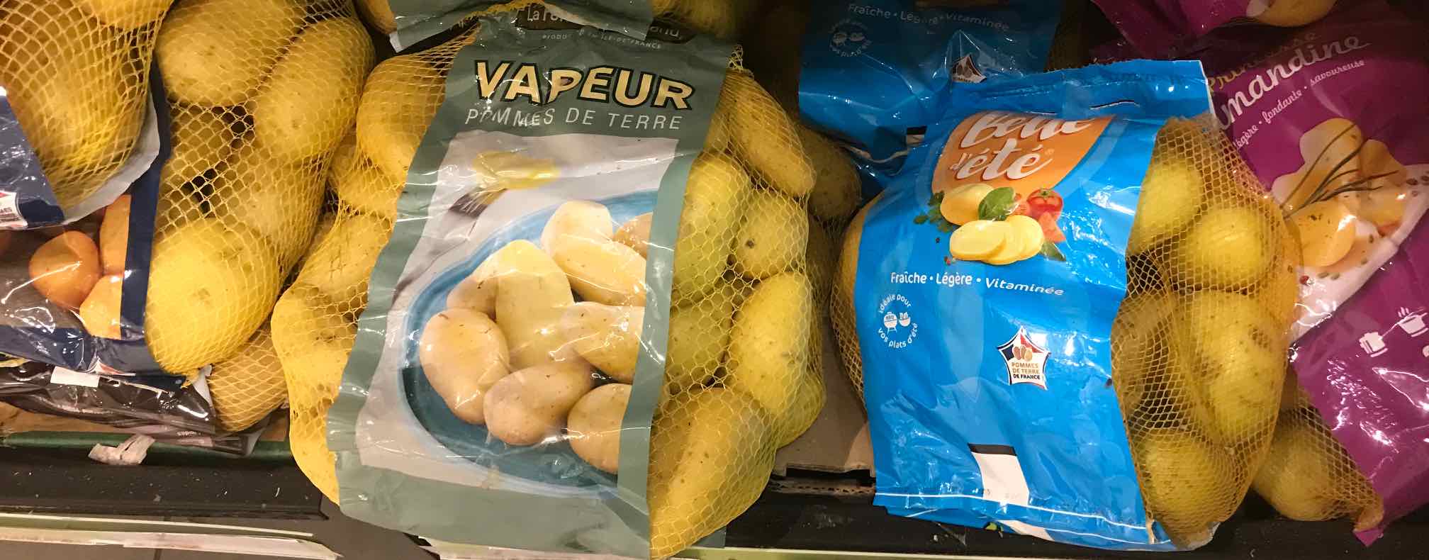 several types of potatoes in a French shop