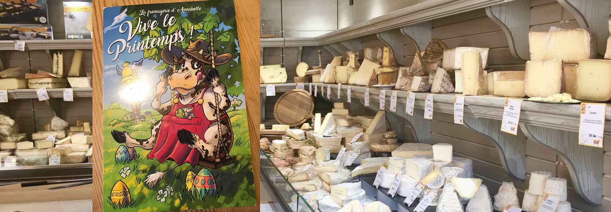 French cheese shop with inset of seasonal postcard saying Vive Spring in French
