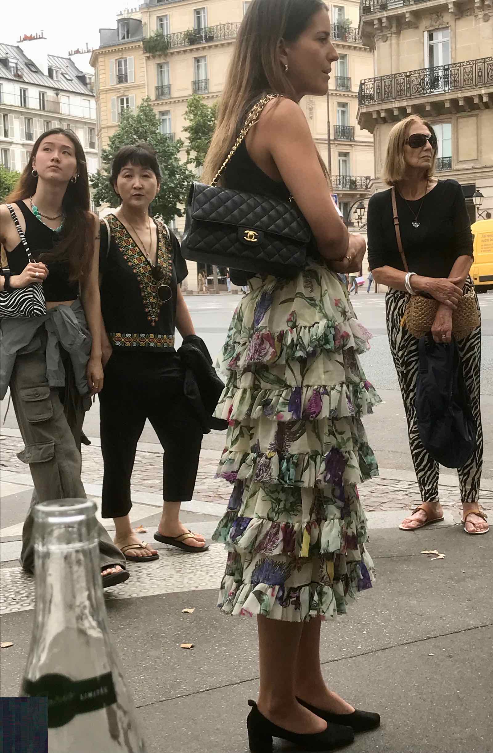 young woman wearing court shoes with ruffled dress